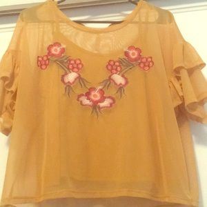 A yellow fall flower print blouse